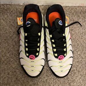 Nike White and Black Sneakers with Pink Accents